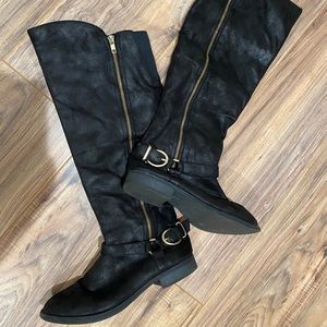 Knee high black riding boots